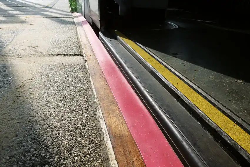 tram stop with tram stop edge and open tram door